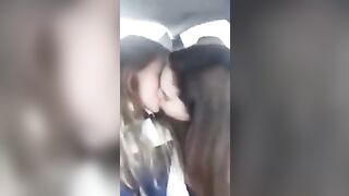 Sweet kissing lesbians in car
