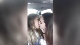 Sweet kissing lesbians in car