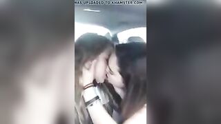 Sweet kissing lesbians in car