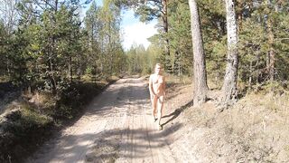 Undressed gal walking in the village