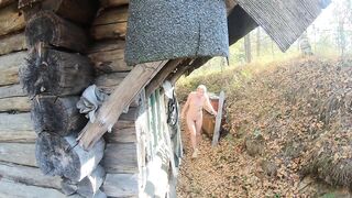 Undressed gal walking in the village