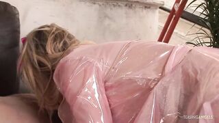 Blond playgirl wears a raincoat whilst getting her snatch smashed