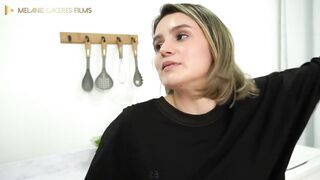 Melanie Caceres's dog bangs her most excellent ally in her kitchen