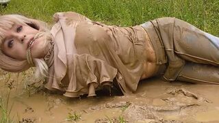 Fastened up and left in the mud! Juicy and bawdy shemale angel pees in her panties!
