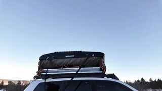 Mountain gal shows off rooftop tent set up and light up booty-plug