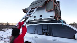 Mountain gal shows off rooftop tent set up and light up booty-plug