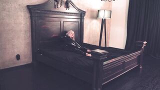 Raunchy latex model with large booty and natural breasts likes to entice.