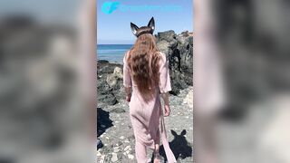 Tiny princess teases on a public beach in advance of sex