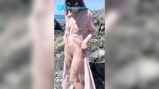 Tiny princess teases on a public beach in advance of sex