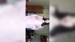 A nice-looking woman bare in nature's garb for a slutty audience.