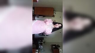 A nice-looking woman bare in nature's garb for a slutty audience.