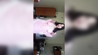 A nice-looking woman bare in nature's garb for a slutty audience.