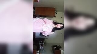 A nice-looking woman bare in nature's garb for a slutty audience.