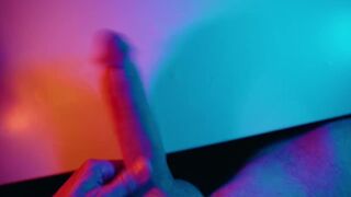 Jerking off my Large White Wang below colored lighting ????
