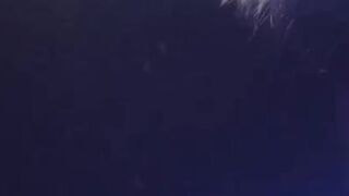 Hot college gal squeezing her bazookas.