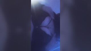 Hot college gal squeezing her bazookas.