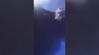 Hot college gal squeezing her bazookas.