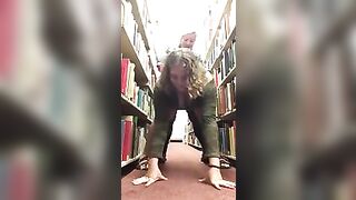 Lesbians fuck in library with strapon
