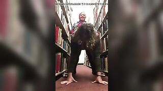 Lesbians fuck in library with strapon