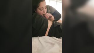 big beautiful woman watches tv and sucks a knob