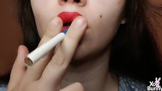 Large red lips smokin' close up