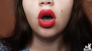 Large red lips smokin' close up