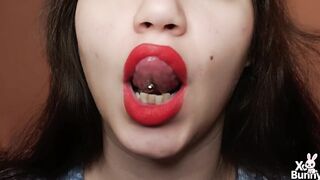 Large red lips smokin' close up