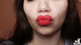 Large red lips smokin' close up