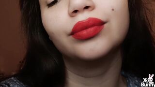 Large red lips smokin' close up