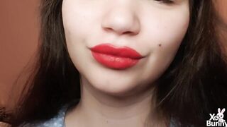 Large red lips smokin' close up