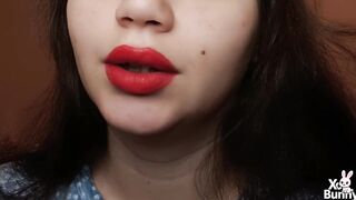 Large red lips smokin' close up