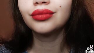 Large red lips smokin' close up