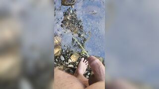 Closeup Pissing in the River