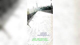 WALKING STRIPPED PUBLIC BRIDGE OUTSIDE