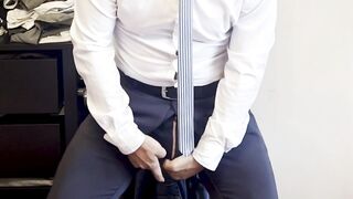 suited gentleman is widening legs like doxy and plays with his malepussy with locked knob