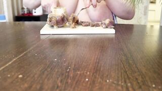 A mother I'd like to fuck is showing off her tits in the kitchen.