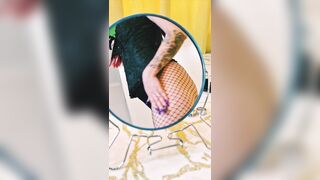 Hawt witch and her magic mirror.