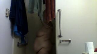 woman taking shower
