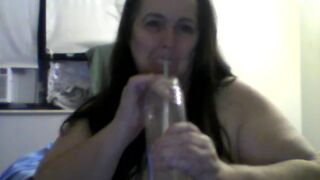 large natural momma drinking