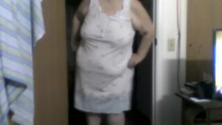 a large woman in nightgown