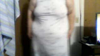 a large woman in nightgown