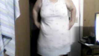 a large woman in nightgown