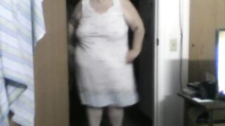 a large woman in nightgown