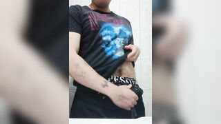 Introvert chap touching himself in the washroom