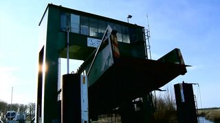 Blond Bombshell Teases with Shlong in Luxury Car