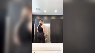 Slutty Gym Doxy Sneaks into Public Baths to Finger Herself