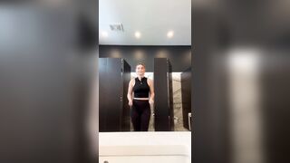 Slutty Gym Doxy Sneaks into Public Baths to Finger Herself