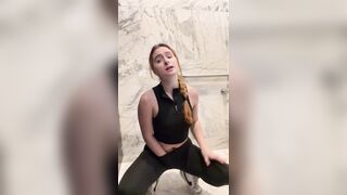 Slutty Gym Doxy Sneaks into Public Baths to Finger Herself