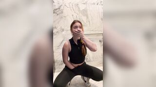 Slutty Gym Doxy Sneaks into Public Baths to Finger Herself