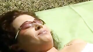 Two housewives oh garden. Who will cum first?